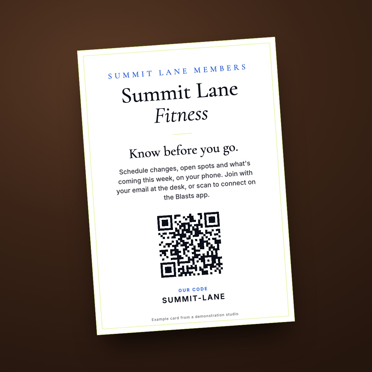 Summit Lane's front-desk card: Know before you go, with the studio's Blasts enrollment code and QR code